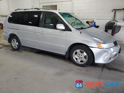 Czwarte zdjęcie samochodu z boku: 2001 HONDA ODYSSEY EX VIN:2HKRL18641H608279 - miniatura