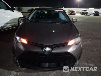 Piąte zdjęcie samochodu w środku: 2018 TOYOTA COROLLA L VIN:5YFBURHE4JP815780 - miniatura