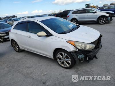 Czwarte zdjęcie samochodu z boku: 2014 HYUNDAI ELANTRA GT VIN:KMHD35LHXEU177593 - miniatura