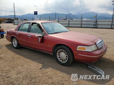 Czwarte zdjęcie samochodu z boku: 2000 FORD CROWN VICTORIA LX VIN:2FAFP74W4YX100974 - miniatura