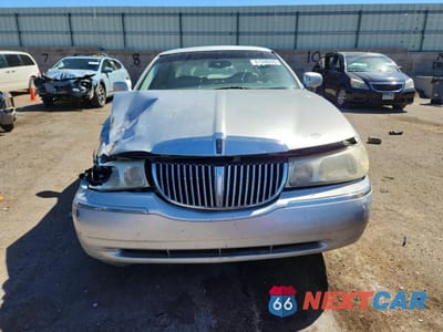Piąte zdjęcie samochodu w środku: 1999 LINCOLN TOWN CAR CARTIER VIN:1LNHM83W7XY621331 - miniatura