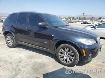 Czwarte zdjęcie samochodu z boku: 2013 BMW X5 XDRIVE50I VIN:5UXZV8C51D0C17224 - miniatura