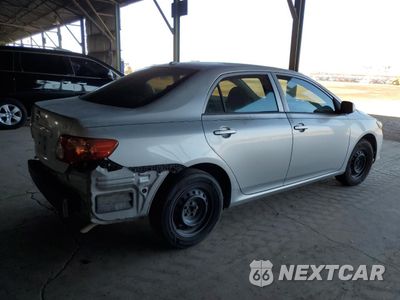 Trzecie zdjęcie samochodu z tyłu: 2010 TOYOTA COROLLA BASE VIN:1NXBU4EE5AZ211371 - miniatura
