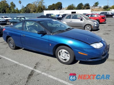 Czwarte zdjęcie samochodu z boku: 2001 SATURN SC1 VIN:1G8ZP128X1Z207319 - miniatura