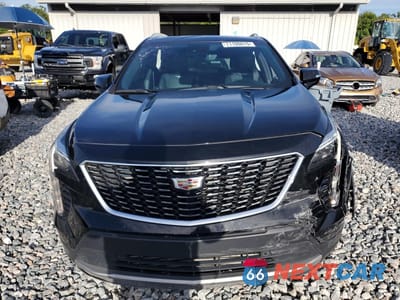 Piąte zdjęcie samochodu w środku: 2022 CADILLAC XT4 PREMIUM LUXURY VIN:1GYFZCR47NF142609 - miniatura