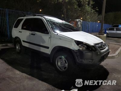 Czwarte zdjęcie samochodu z boku: 2002 HONDA CR-V LX VIN:JHLRD68402C001854 - miniatura
