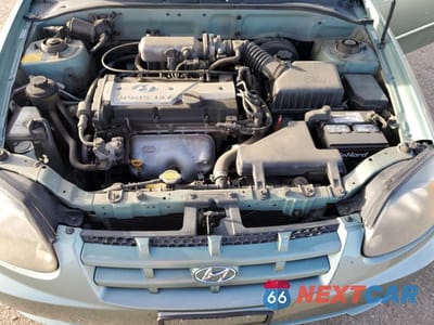 Zdjęcie 11 z 14 samochodu: 2004 HYUNDAI ACCENT GL VIN:KMHCG35C14U308396 - miniatura