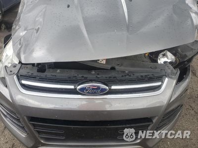 Zdjęcie 12 z 13 samochodu: 2014 FORD ESCAPE TITANIUM VIN:1FMCU9J92EUE22978 - miniatura