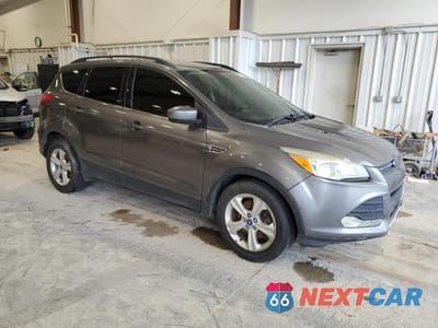 Czwarte zdjęcie samochodu z boku: 2014 FORD ESCAPE SE VIN:1FMCU9G98EUA95672 - miniatura