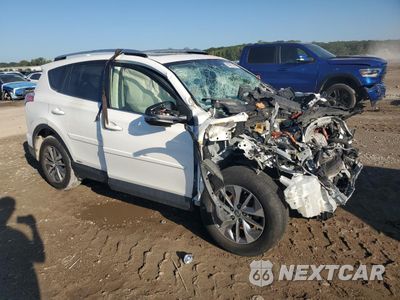 Czwarte zdjęcie samochodu z boku: 2016 TOYOTA RAV4 HV XLE VIN:JTMRJREV9GD011482 - miniatura