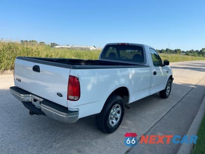 Czwarte zdjęcie samochodu z boku: 1997 FORD F250 VIN:1FTFF27L8VKD08887 - miniatura