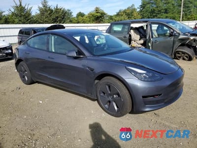 Czwarte zdjęcie samochodu z boku: 2023 TESLA MODEL 3 VIN:5YJ3E1EA1PF508561 - miniatura