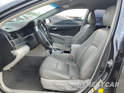 Zdjęcie 7 z 12 samochodu: 2013 TOYOTA CAMRY HYBRID VIN:4T1BD1FK3DU072817 - miniatura