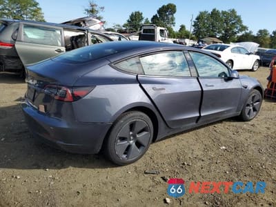 Trzecie zdjęcie samochodu z tyłu: 2023 TESLA MODEL 3 VIN:5YJ3E1EA1PF508561 - miniatura