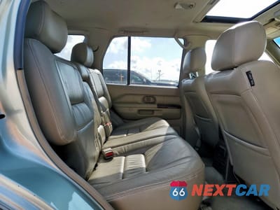 Zdjęcie 11 z 14 samochodu: 1999 INFINITI QX4 VIN:JNRAR07Y1XW066134 - miniatura
