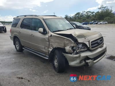 Czwarte zdjęcie samochodu z boku: 2004 TOYOTA SEQUOIA SR5 VIN:5TDZT34A94S215012 - miniatura