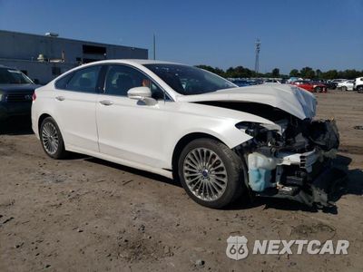 Czwarte zdjęcie samochodu z boku: 2014 FORD FUSION TITANIUM VIN:3FA6P0D91ER362396 - miniatura