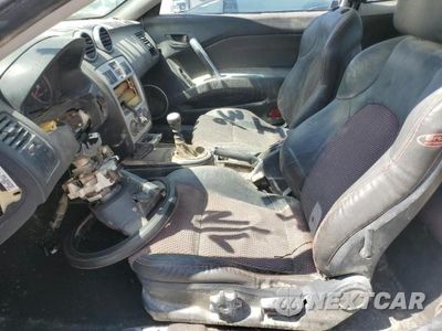 Zdjęcie 7 z 12 samochodu: 2005 HYUNDAI TIBURON VIN:KMHHN65F25U168299 - miniatura