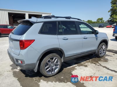 Trzecie zdjęcie samochodu z tyłu: 2023 HONDA PASSPORT EXL VIN:5FNYF8H56PB021768 - miniatura