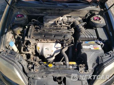 Zdjęcie 11 z 14 samochodu: 2005 HYUNDAI TIBURON VIN:KMHHM65D65U178514 - miniatura