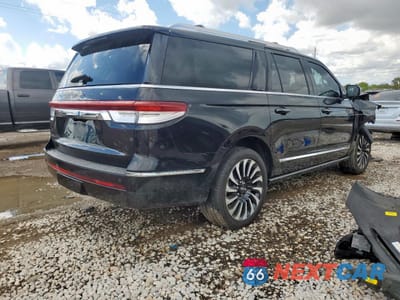Trzecie zdjęcie samochodu z tyłu: 2023 LINCOLN NAVIGATOR L BLACK LABEL VIN:5LMJJ3TG4PEL16566 - miniatura