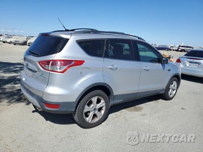 Trzecie zdjęcie samochodu z tyłu: 2014 FORD ESCAPE SE VIN:1FMCU0GX1EUD31993 - miniatura