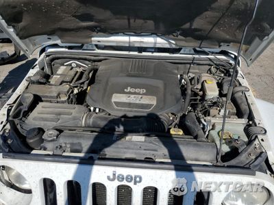 Zdjęcie 12 z 15 samochodu: 2013 JEEP WRANGLER UNLIMITED SAHARA VIN:1C4BJWEG4DL537747 - miniatura
