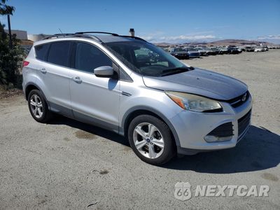 Czwarte zdjęcie samochodu z boku: 2014 FORD ESCAPE SE VIN:1FMCU0GX1EUD31993 - miniatura