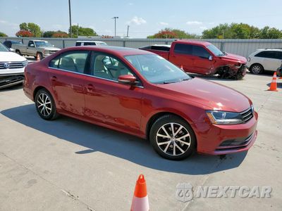 Czwarte zdjęcie samochodu z boku: 2017 VOLKSWAGEN JETTA SE VIN:3VWDB7AJ7HM396087 - miniatura