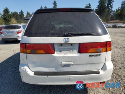 Zdjęcie 6 z 15 samochodu: 2002 HONDA ODYSSEY EX VIN:2HKRL18672H536236 - miniatura