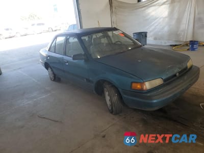 Czwarte zdjęcie samochodu z boku: 1994 MAZDA PROTEGE DX VIN:JM1BG2248R0778768 - miniatura