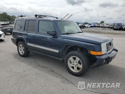 Czwarte zdjęcie samochodu z boku: 2009 JEEP COMMANDER LIMITED VIN:1J8HG58P19C517910 - miniatura