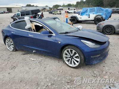 Czwarte zdjęcie samochodu z boku: 2019 TESLA MODEL 3 VIN:5YJ3E1EB4KF433825 - miniatura