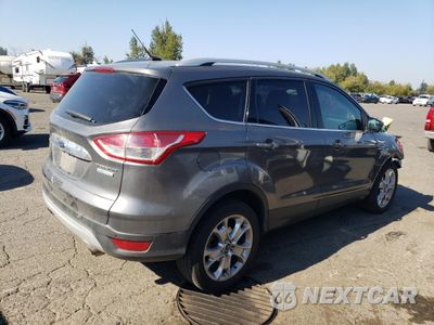 Trzecie zdjęcie samochodu z tyłu: 2014 FORD ESCAPE TITANIUM VIN:1FMCU0JX7EUB32777 - miniatura