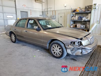 Czwarte zdjęcie samochodu z boku: 2005 FORD CROWN VICTORIA LX VIN:2FAFP74W55X124874 - miniatura