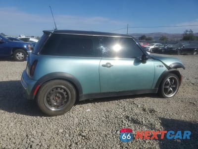 Trzecie zdjęcie samochodu z tyłu: 2002 MINI COOPER VIN:WMWRC33442TE12938 - miniatura