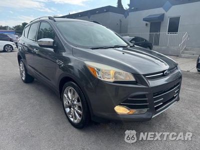 Czwarte zdjęcie samochodu z boku: 2016 FORD ESCAPE SE VIN:1FMCU0GX4GUC35892 - miniatura