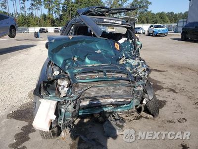 Zdjęcie 12 z 13 samochodu: 1998 TOYOTA RAV4 BASE VIN:JT3GP10V0W7039882 - miniatura