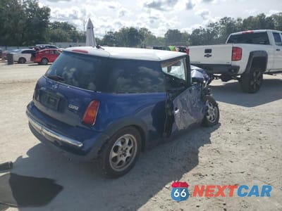 Trzecie zdjęcie samochodu z tyłu: 2003 MINI COOPER VIN:WMWRC33483TC47915 - miniatura