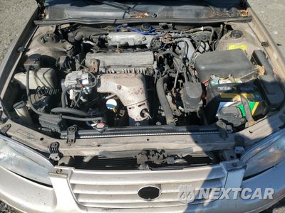Zdjęcie 11 z 12 samochodu: 1999 TOYOTA CAMRY LE VIN:JT2BG22K2X0277444 - miniatura