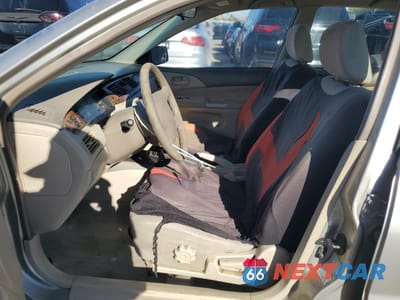 Zdjęcie 7 z 14 samochodu: 2003 MITSUBISHI LANCER ES VIN:JA3AJ26E33U043582 - miniatura