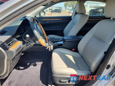 Zdjęcie 7 z 14 samochodu: 2014 LEXUS ES 300H VIN:JTHBW1GG2E2051154 - miniatura