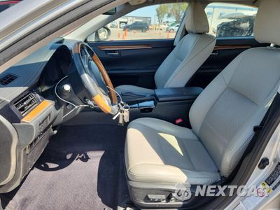 Zdjęcie 7 z 14 samochodu: 2014 LEXUS ES 300H VIN:JTHBW1GG2E2051154 - miniatura