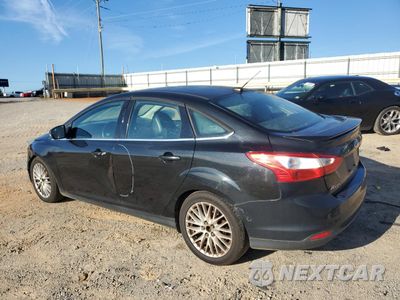 Drugie zdjęcie samochodu z przodu: 2014 FORD FOCUS TITANIUM VIN:1FADP3J2XEL316175 - miniatura