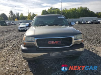 Piąte zdjęcie samochodu w środku: 1999 GMC NEW SIERRA K1500 VIN:1GTEK19T8XZ535635 - miniatura