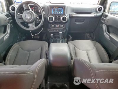 Zdjęcie 8 z 16 samochodu: 2017 JEEP WRANGLER UNLIMITED SAHARA VIN:1C4HJWEG8HL596364 - miniatura