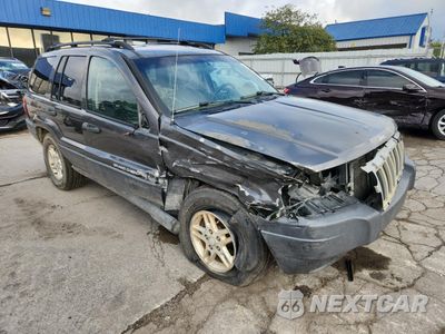 Czwarte zdjęcie samochodu z boku: 2004 JEEP GRAND CHEROKEE LAREDO VIN:1J4GW48SX4C314912 - miniatura