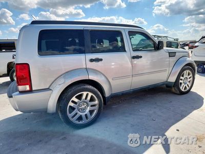 Trzecie zdjęcie samochodu z tyłu: 2011 DODGE NITRO HEAT VIN:1D4PT4GK7BW589880 - miniatura