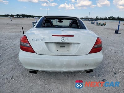 Zdjęcie 6 z 13 samochodu: 2009 MERCEDES-BENZ SLK 350 VIN:WDBWK58F19F190636 - miniatura