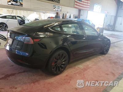 Trzecie zdjęcie samochodu z tyłu: 2023 TESLA MODEL 3 VIN:5YJ3E1EC1PF627695 - miniatura
